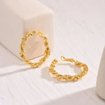 Load image into Gallery viewer, 14k Deluxe Textured Spiral Hoop Earrings