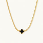 Load image into Gallery viewer, Dainty 18K gold-plated herringbone chain necklace with black enamel quatrefoil clover pendant on white background