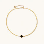 Load image into Gallery viewer, Dainty 18K gold-plated herringbone chain necklace with black enamel quatrefoil clover pendant on white background