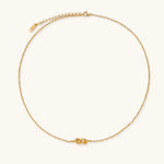 Load image into Gallery viewer, Dainty 18K gold plated necklace with infinity knot pendant on delicate chain against white background