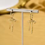 Load image into Gallery viewer, Dainty Dangle Bow Earrings