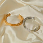 Load image into Gallery viewer, 18k Triple Ribbed Bangle Bracelet