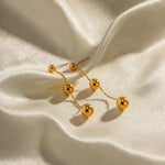 Load image into Gallery viewer, Dangle Gold Bead Tassel Earrings