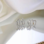 Load image into Gallery viewer, Four Prong Zirconia Inlay Huggie Earrings
