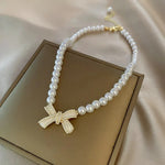 Load image into Gallery viewer, Beaded Pearl Bow Necklace