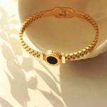 Load image into Gallery viewer, Black Center Roman Numeral Accented Bangle Bracelet