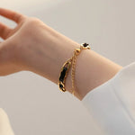 Load image into Gallery viewer, Braided Gold and Black Chain Leather Bracelet