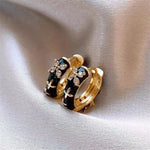 Load image into Gallery viewer, Dainty Black and Gold Floral Hoop Earrings
