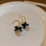Load image into Gallery viewer, Dainty Bow Diamond Dangle Earrings