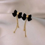Load image into Gallery viewer, Dainty Bow Gold Dangle Earrings