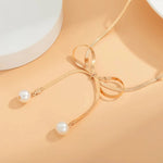 Load image into Gallery viewer, Dainty Herringbone Pearl Bow Necklace