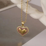 Load image into Gallery viewer, Diamond Filled Heart Necklaces