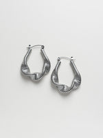 Load image into Gallery viewer, Lyra Silver Flowing Wave Hoop Earrings