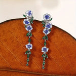 Load image into Gallery viewer, Glossy Blue Floral Dangling Earrings