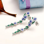Load image into Gallery viewer, Glossy Blue Floral Dangling Earrings