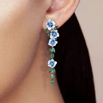 Load image into Gallery viewer, Glossy Blue Floral Dangling Earrings