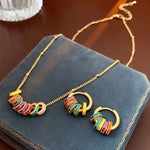 Load image into Gallery viewer, Gold Accented Colorful Circles Necklace and Earrings