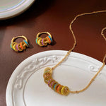 Load image into Gallery viewer, Gold Accented Colorful Circles Necklace and Earrings