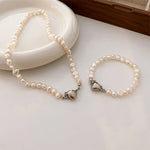 Load image into Gallery viewer, Magnetic Heart Pearl Choker Necklace and Bracelet