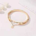 Load image into Gallery viewer, Roman Numeral Heart Dangle Cuff Bracelet