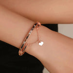 Load image into Gallery viewer, Roman Numeral Heart Dangle Cuff Bracelet
