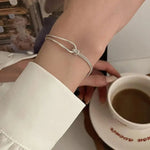 Load image into Gallery viewer, S925 Twisted Knot Round Bar Bracelet
