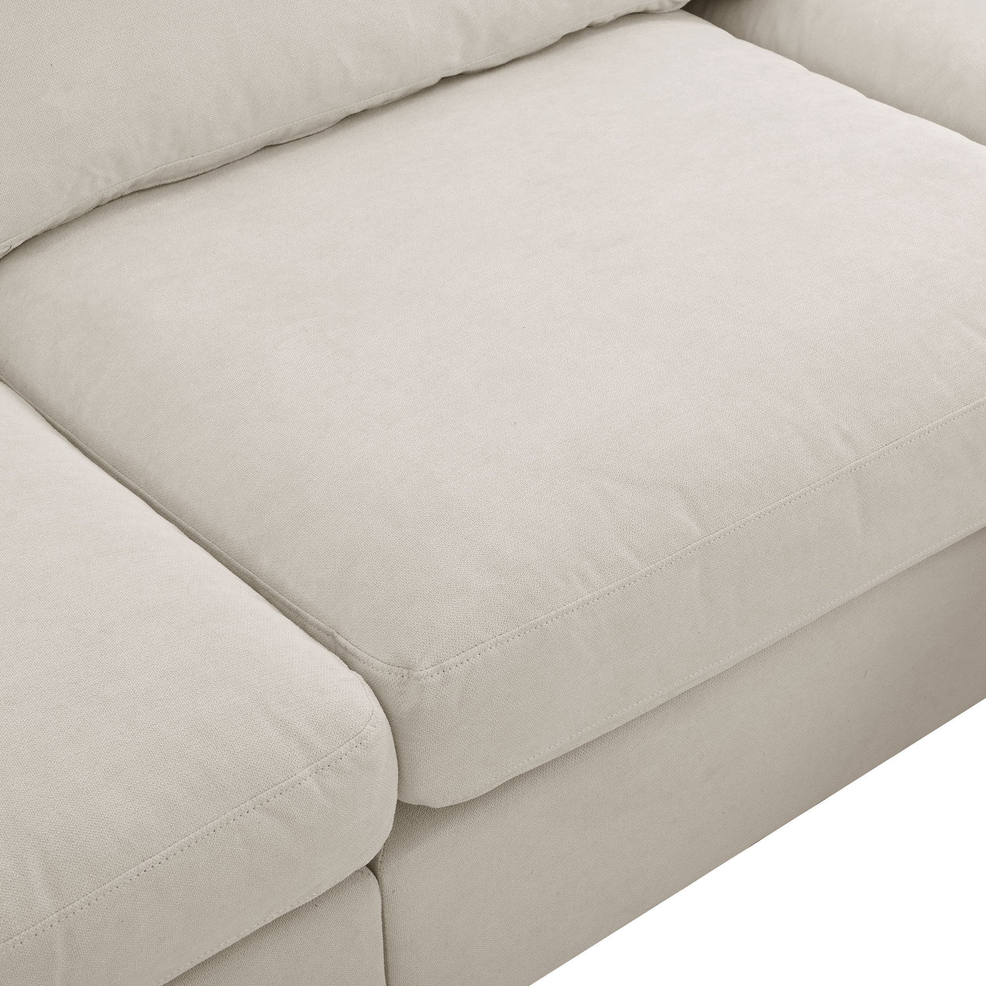 Spacious Beige Sectional Sofa with Adjustable Footrest and Deep Cushions