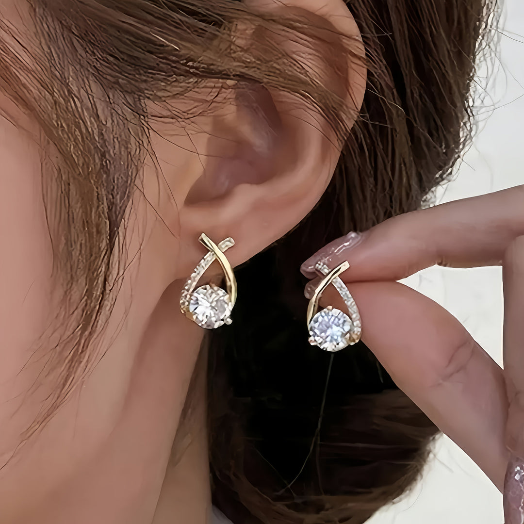 Elegant Zirconia Cross Stud Earrings in Gold