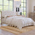 Upholstered Platform Bed with Saddle Curved Headboard and Diamond Tufted Details in Beige