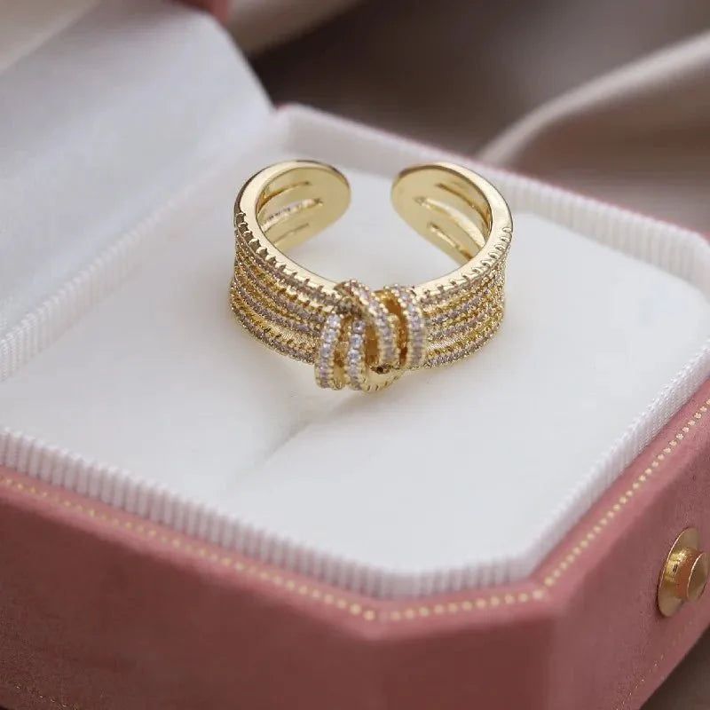 14k dainty layered diamond knot ring