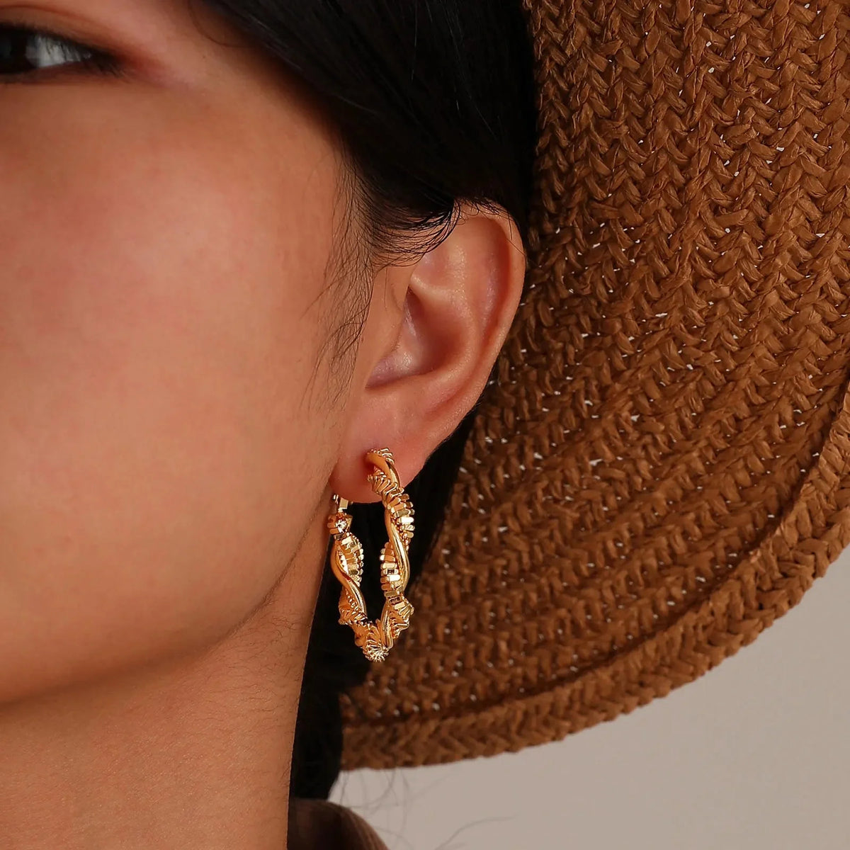 14k deluxe textured spiral hoop earrings
