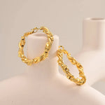 Load image into Gallery viewer, 14k Deluxe Textured Spiral Hoop Earrings
