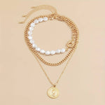 Load image into Gallery viewer, Pearl and Vintage Pendant Chain 3 Piece Pendant and Pearl Necklace Set
