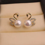 Load image into Gallery viewer, Gold Diamond Swan Earrings Gold Swan Earrings with Pearl
