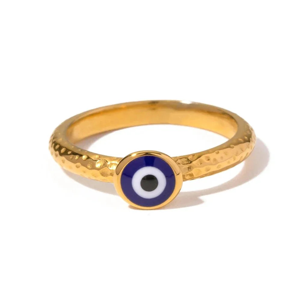 18k Bohemian Evil Eye Rings gold ring with a blue evil eye charm displayed on a white background.
