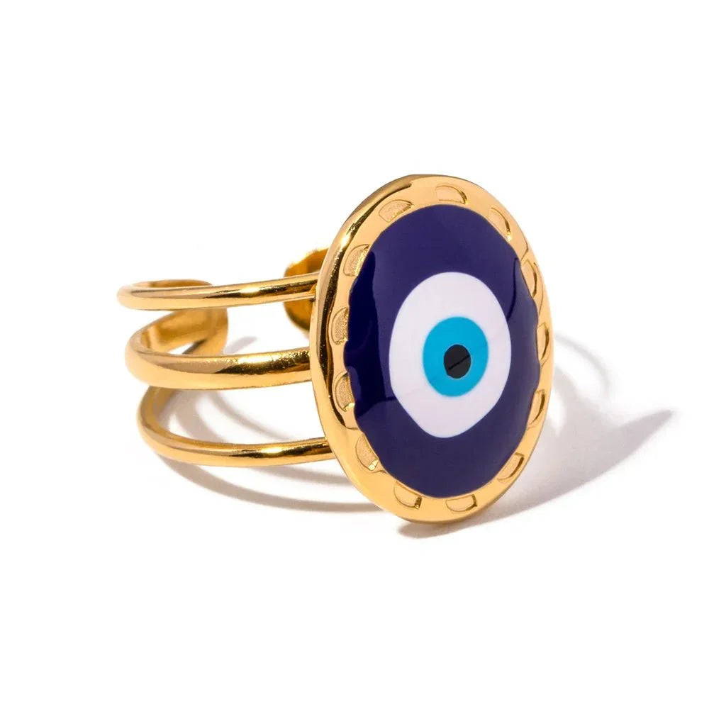 18k Bohemian Evil Eye Rings gold ring with a blue and white evil eye design displayed on a white background.