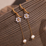 Load image into Gallery viewer, 18k Dangling Floral Pearl Earrings
