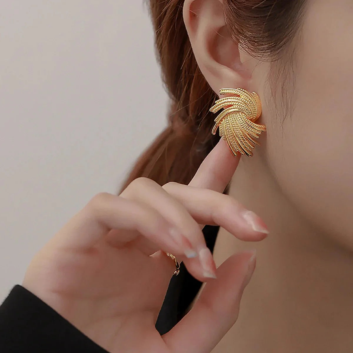 18k spiraling braided dainty earrings