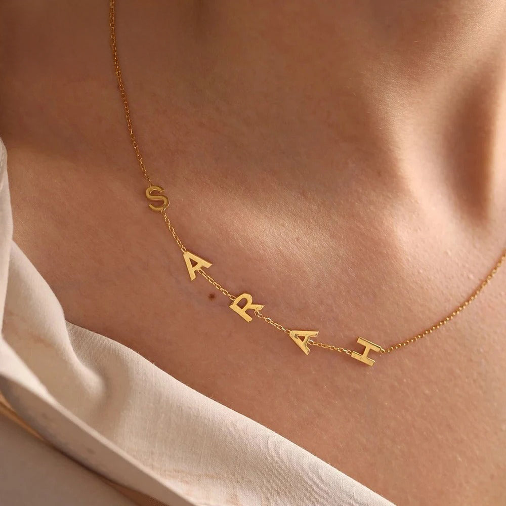 Personalized off center letter necklace