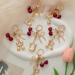 Load image into Gallery viewer, Bubble Initial With Bow &amp; Cherry Charms Keychain
