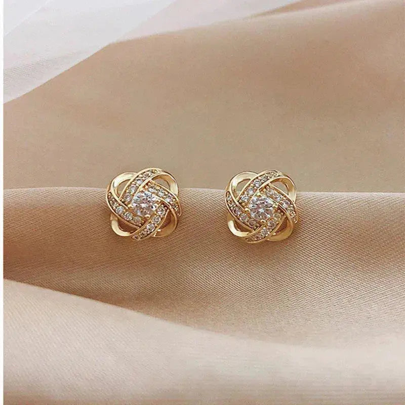 Classic crystal floral stud earrings in gold