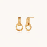 Load image into Gallery viewer, Gold stud earrings with vertical ridged bar connecting to triple interlocking circular rings on white background
