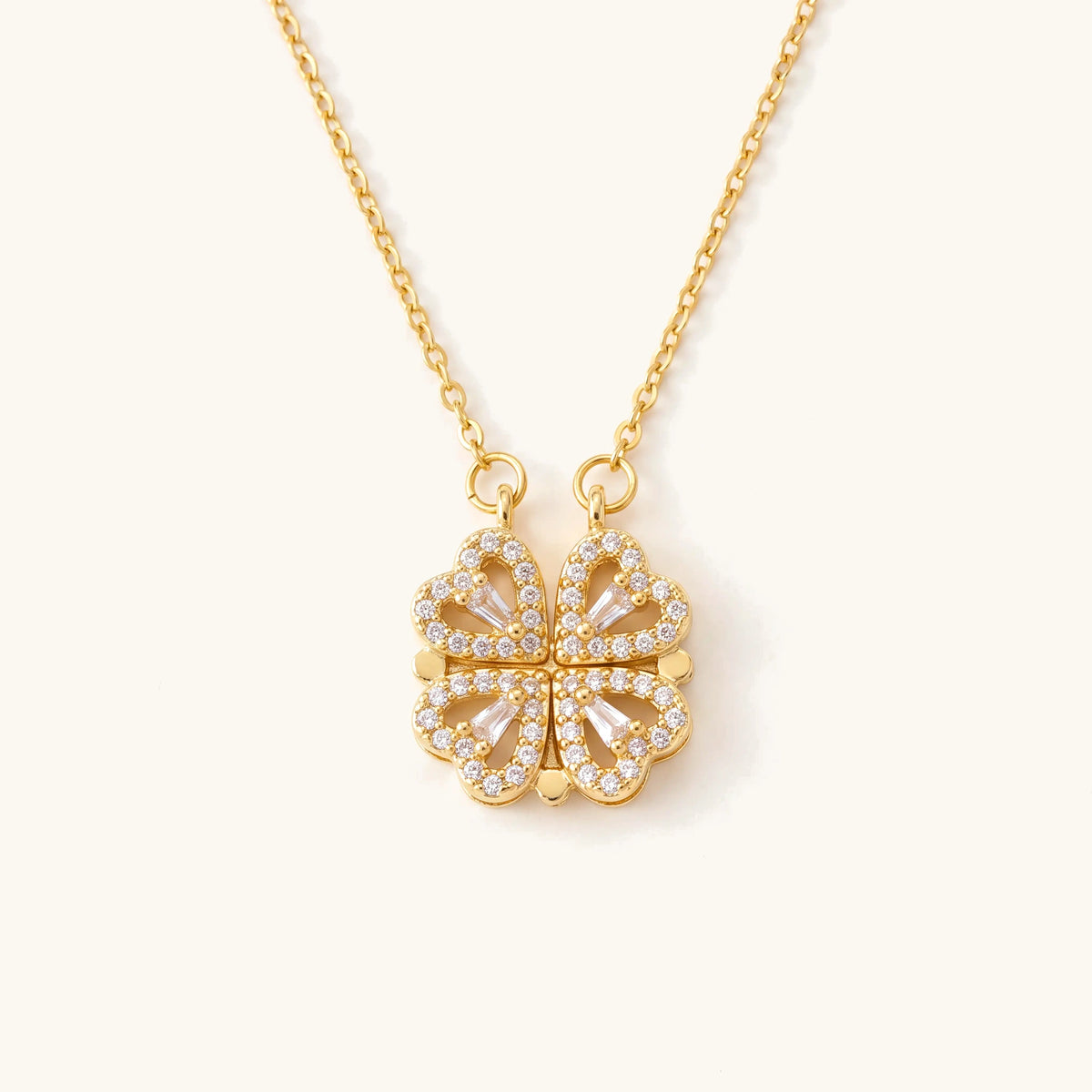 Four Leaf Clover Magnetic Heart Necklace in gold