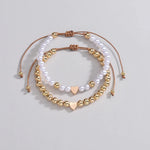 Load image into Gallery viewer, 2pcs Classy White &amp; Gold Beaded Heart Bracelets
