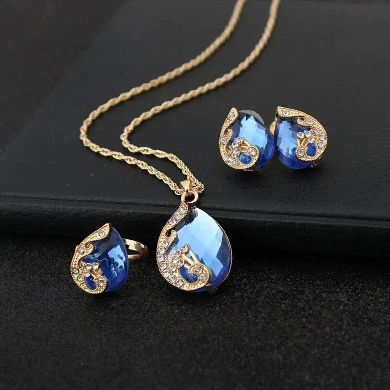 Delicate Blue Crystal Necklace and Earrings Set in Gold