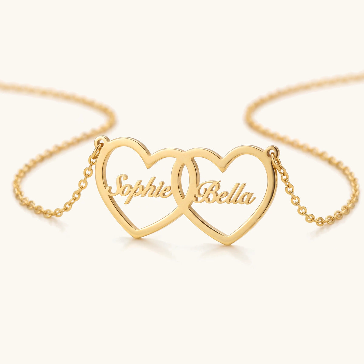 Dainty Personalized Dual Heart Name Necklace – angled close-up of the double heart name pendant