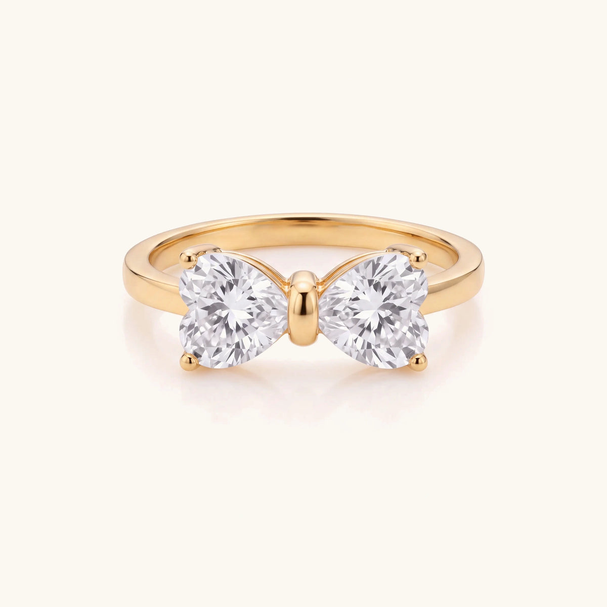 S925 Moissanite Feminine Bow Ring in gold, top view of the heart-cut bow