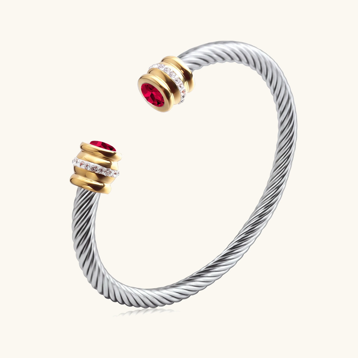 Twisted birthstone cuff bracelet in two-tone gold and silver with January garnet stones
