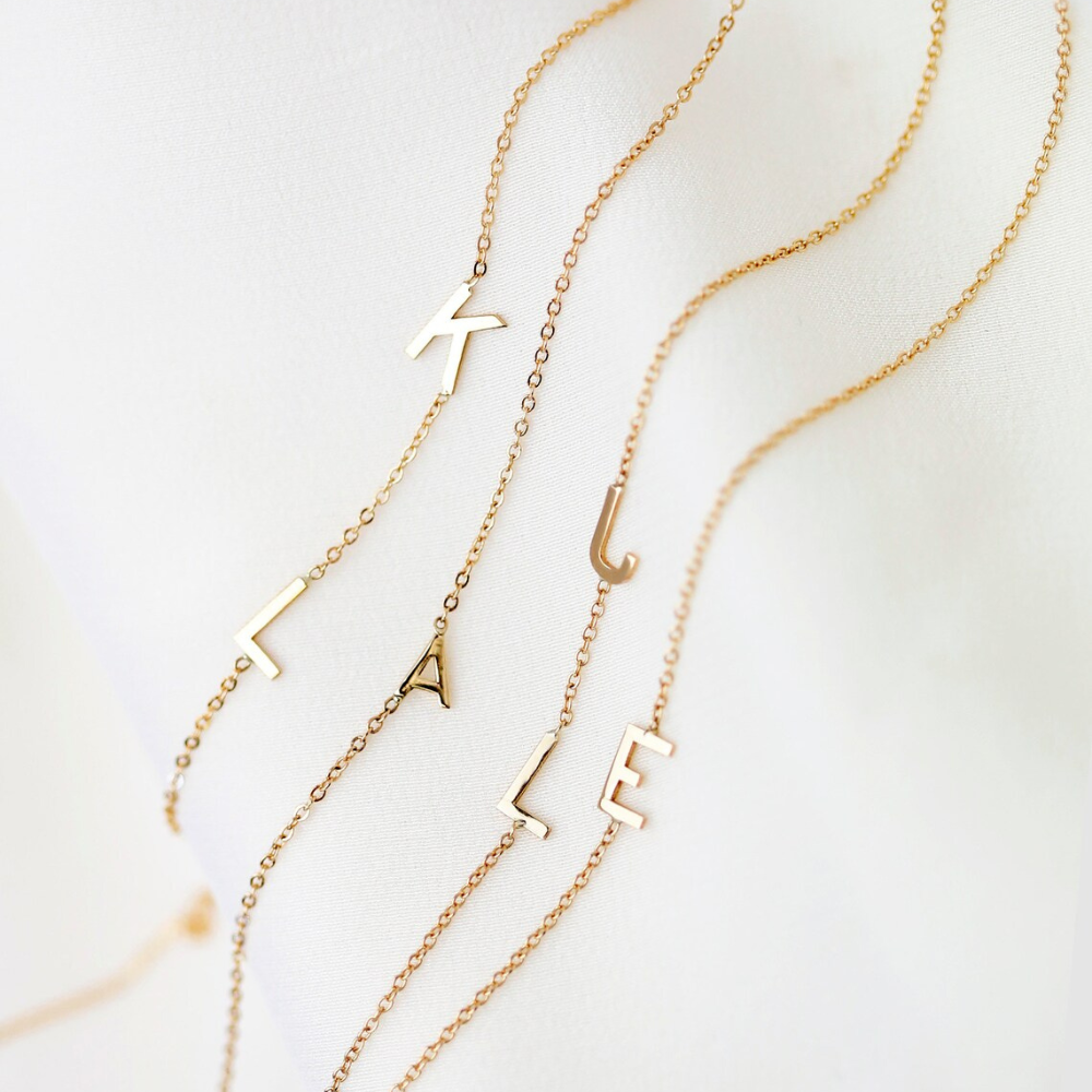 Gold name bracelet personalised initial bracelet