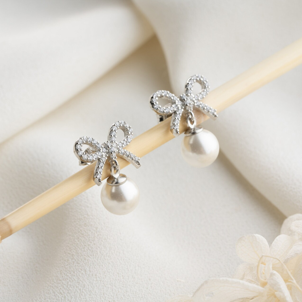Gold Bow Pearl Dangle Earrings